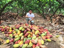 A selfie with cacao pods right after they were harvested and just before they are broken for their beans (May 2015). 